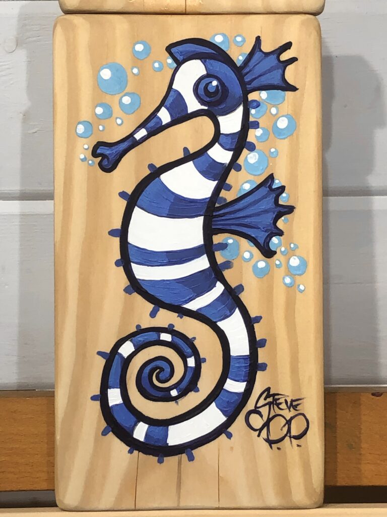 Cobalt blue and white striped salty seahorse painted on wood