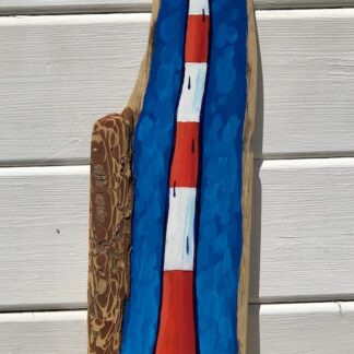 white classic striped lighthouse painted on wood